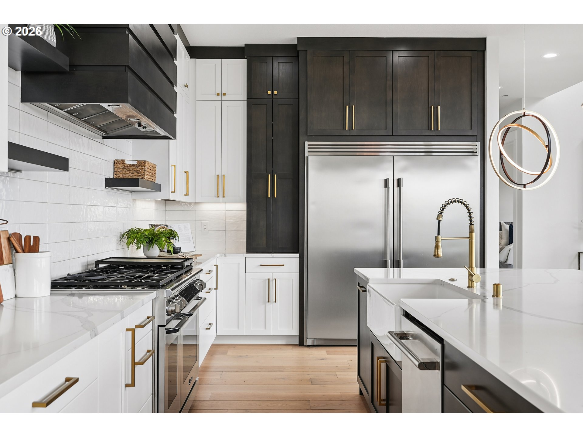 1757 North Columbia Ridge Way Washougal, WA 98671 - Photo 16 of 48 a kitchen with stainless steel appliances a sink a stove and cabinets