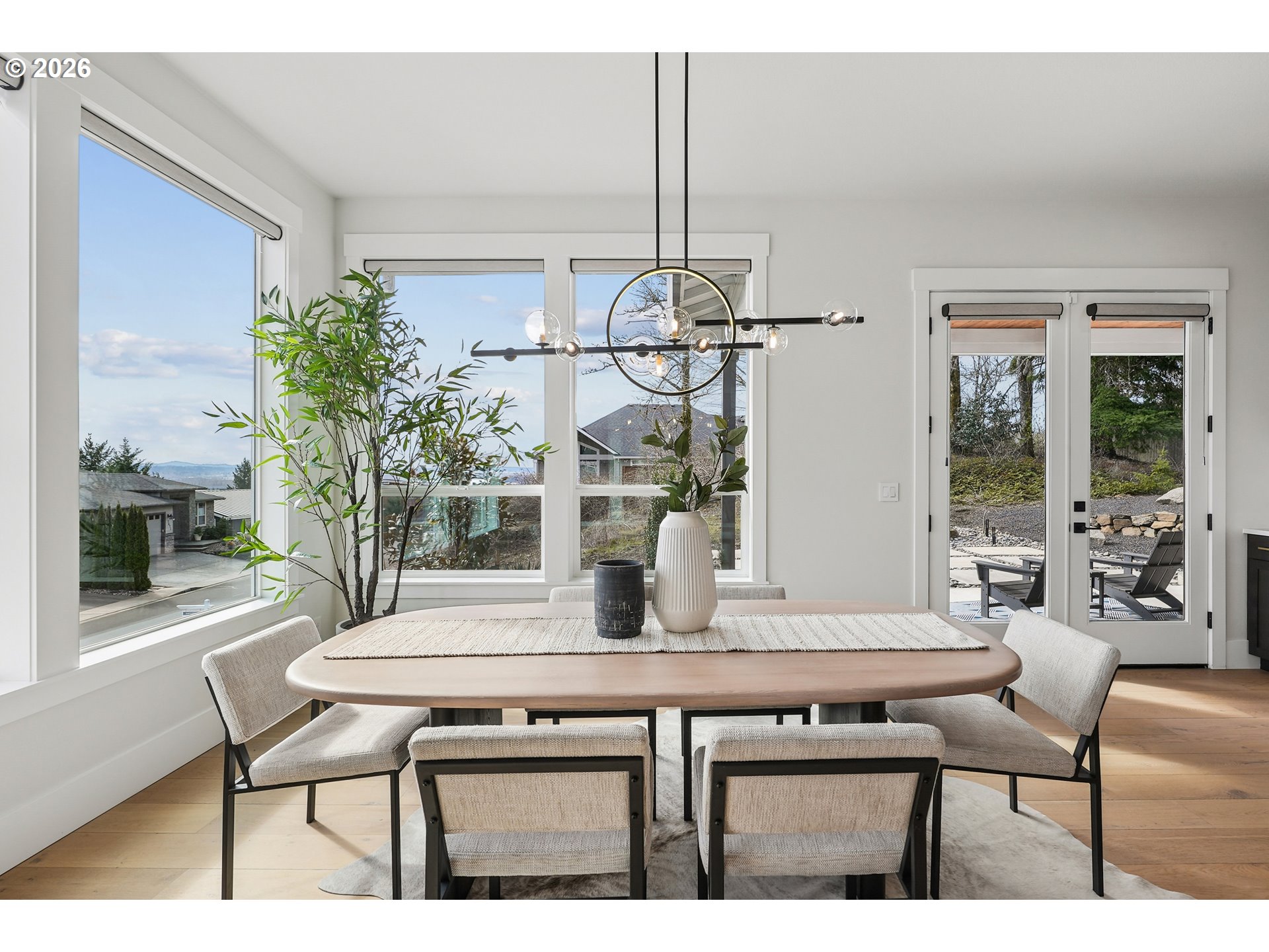 1757 North Columbia Ridge Way Washougal, WA 98671 - Photo 17 of 48 a view of a dining room with furniture and wooden floor