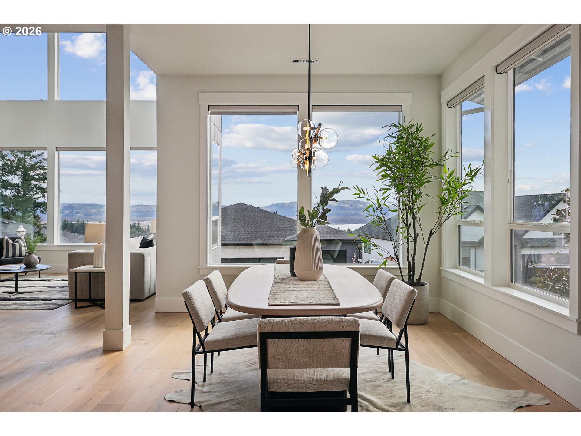 1757 North Columbia Ridge Way Washougal, WA 98671 - Photo 19 of 48 a view of a dining room with furniture window and wooden floor