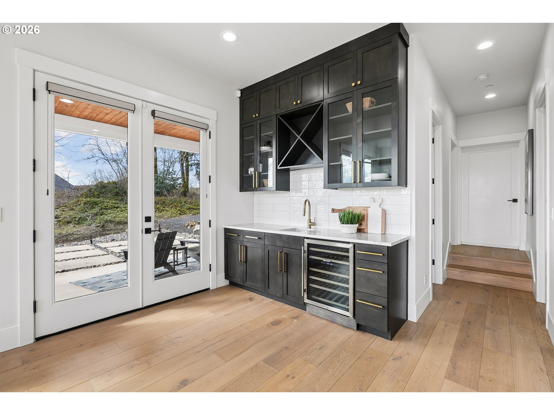 1757 North Columbia Ridge Way Washougal, WA 98671 - Photo 20 of 48 a hallway with cabinets and wooden floor
