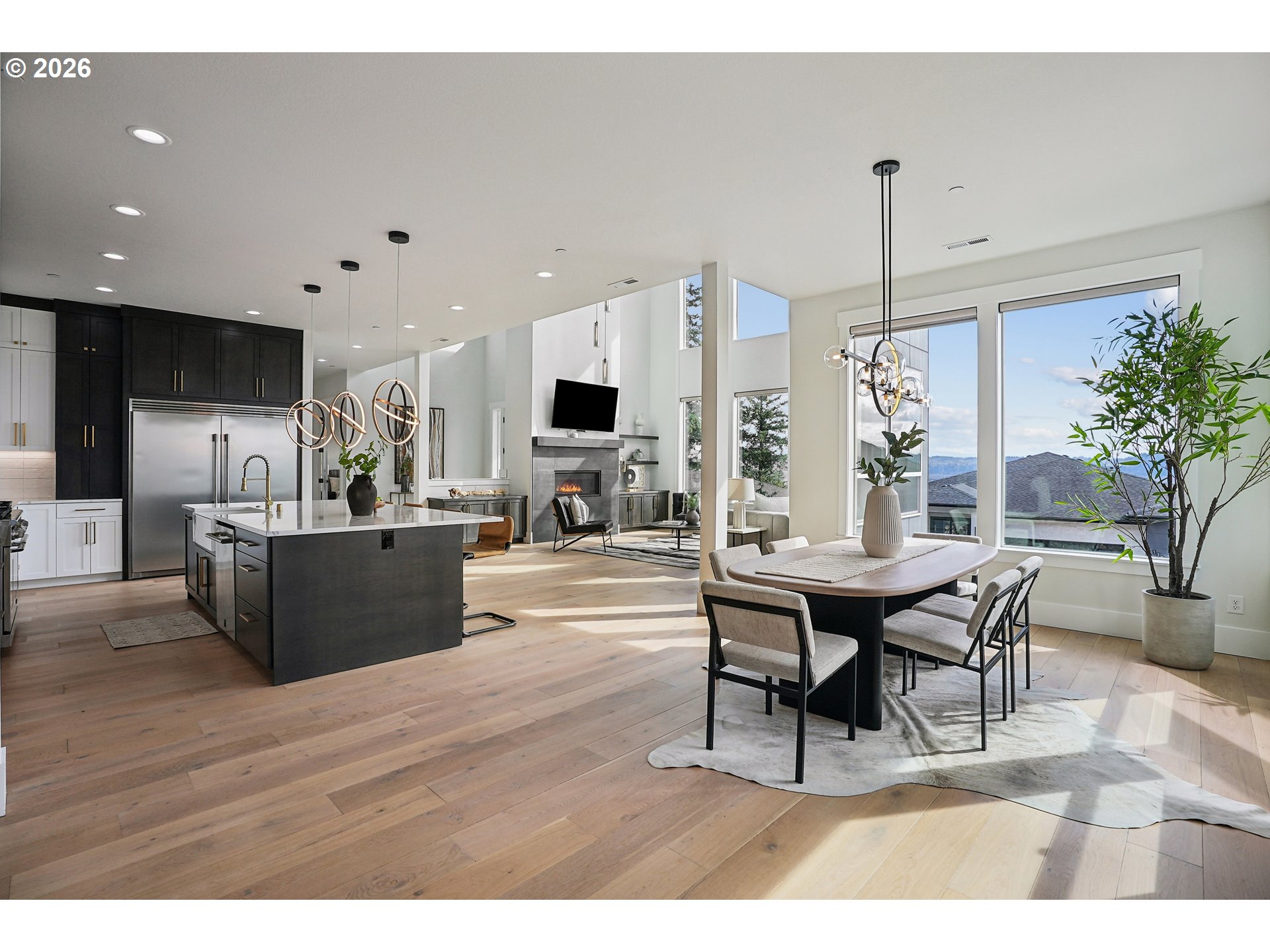 1757 North Columbia Ridge Way Washougal, WA 98671 - Photo 22 of 48 a living room with stainless steel appliances kitchen island granite countertop furniture wooden floor and a view of kitchen