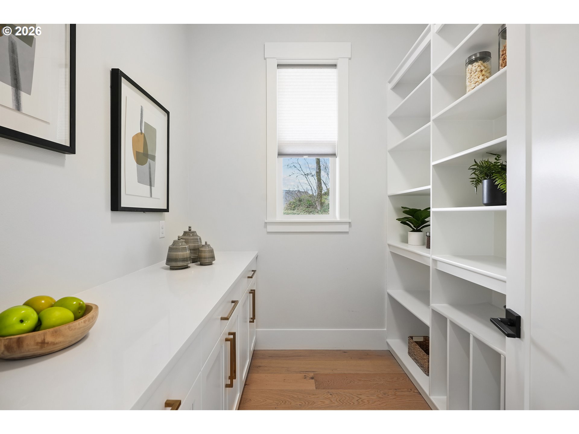 1757 North Columbia Ridge Way Washougal, WA 98671 - Photo 23 of 48 a kitchen with a refrigerator and a wooden floor