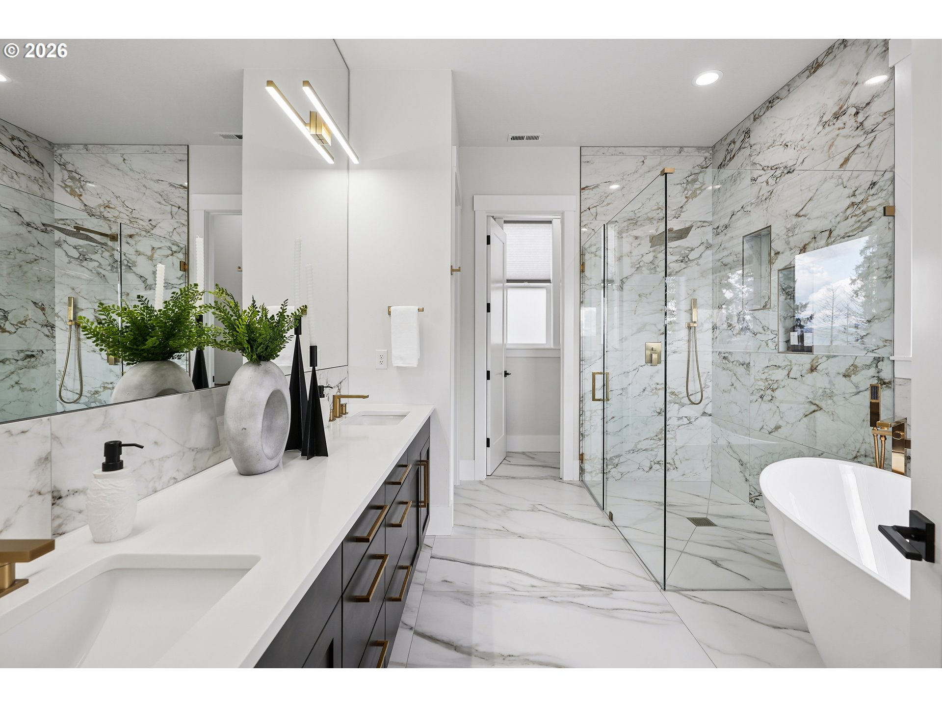 1757 North Columbia Ridge Way Washougal, WA 98671 - Photo 26 of 48 a en suite bathroom with a double vanity sink a large mirror a shower and a bathtub