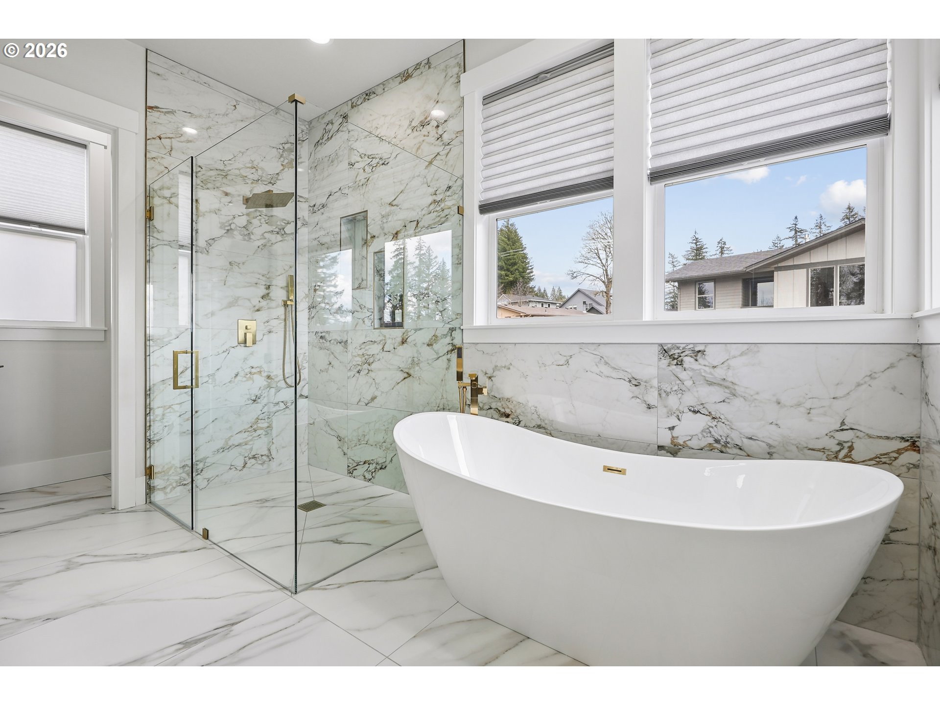 1757 North Columbia Ridge Way Washougal, WA 98671 - Photo 28 of 48 a bathroom with a bathtub and shower