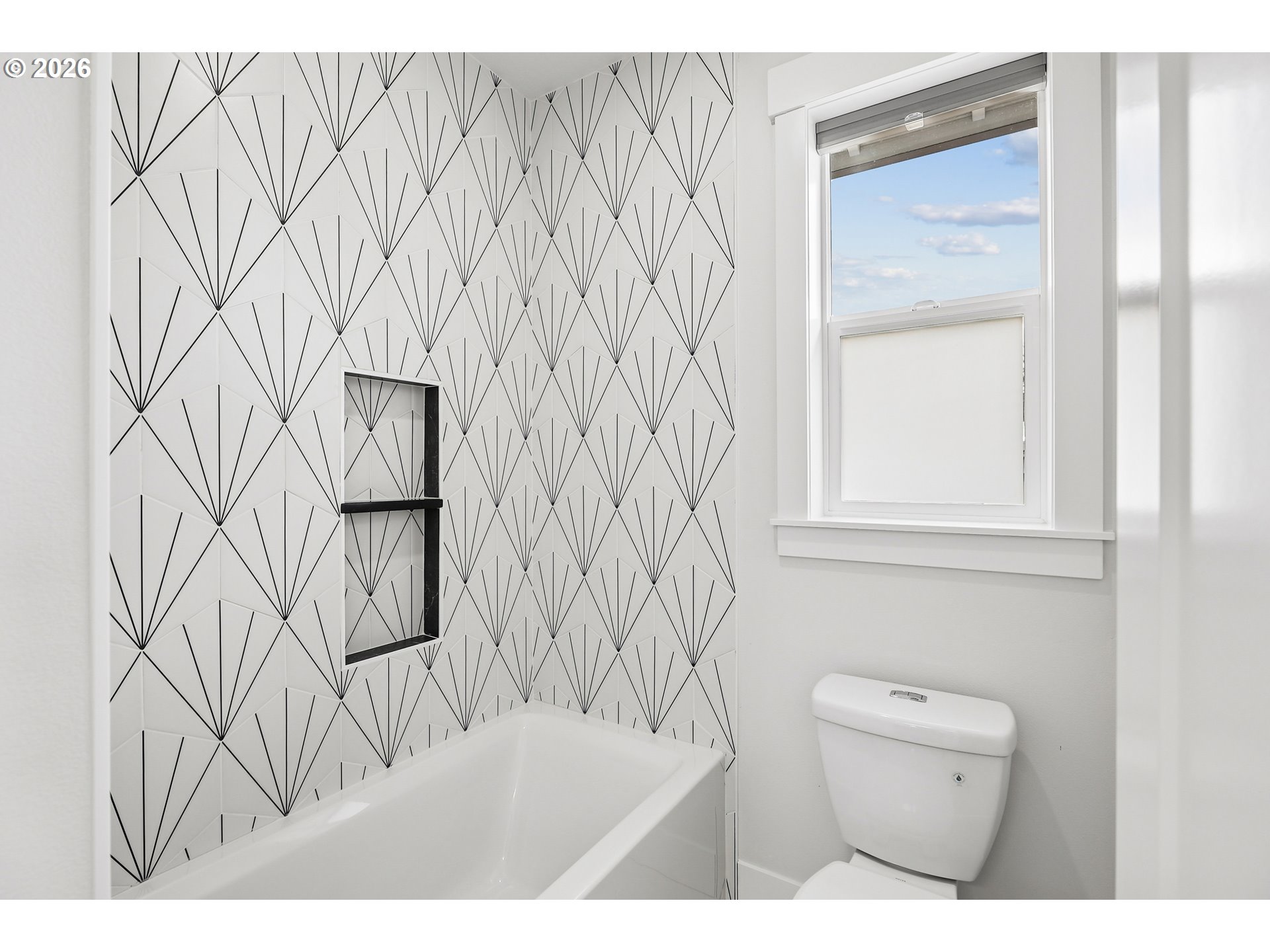 1757 North Columbia Ridge Way Washougal, WA 98671 - Photo 34 of 48 a bathroom with a toilet and a shower curtain