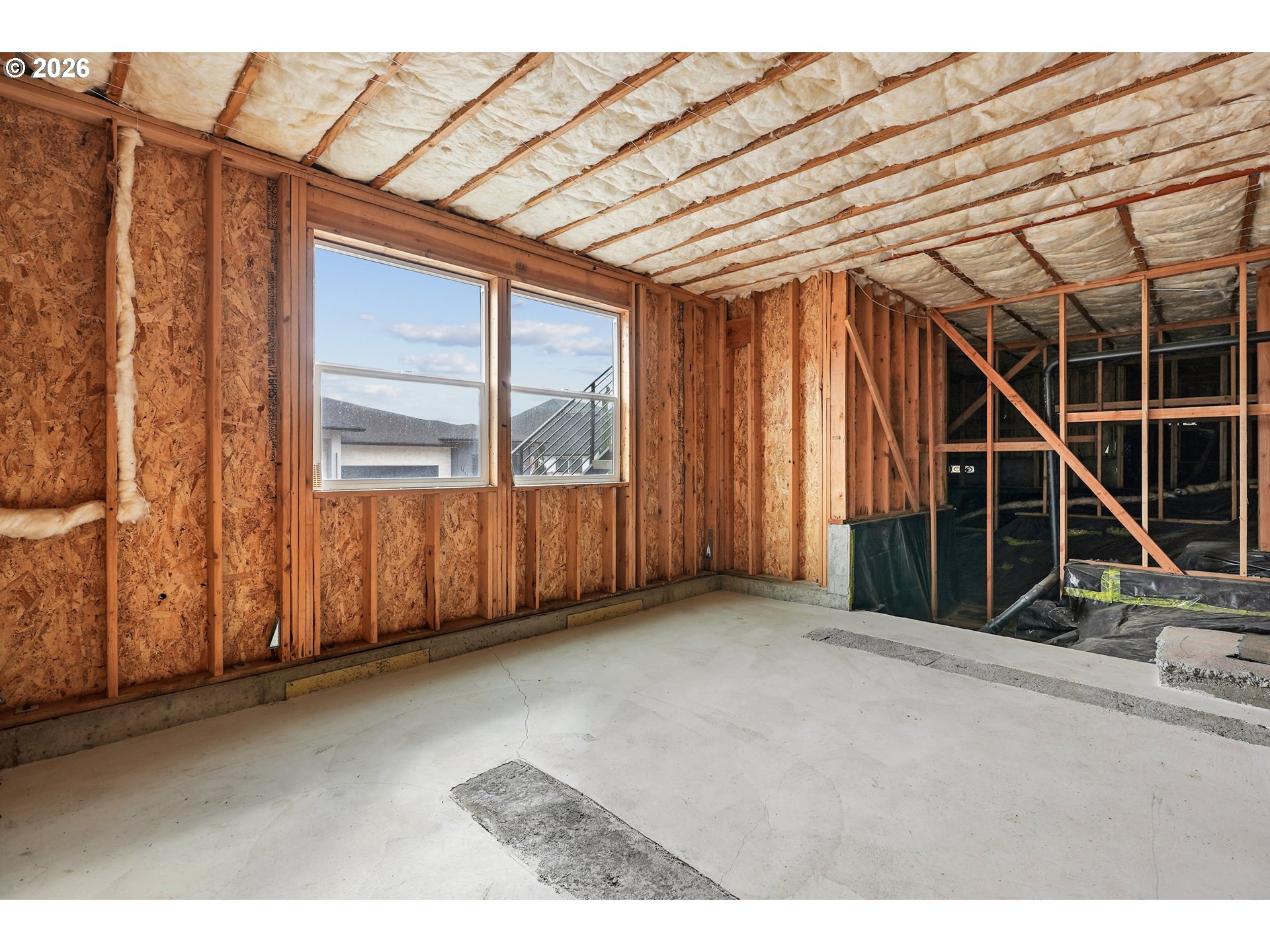 1757 North Columbia Ridge Way Washougal, WA 98671 - Photo 44 of 48 a view of a room with wooden walls and windows