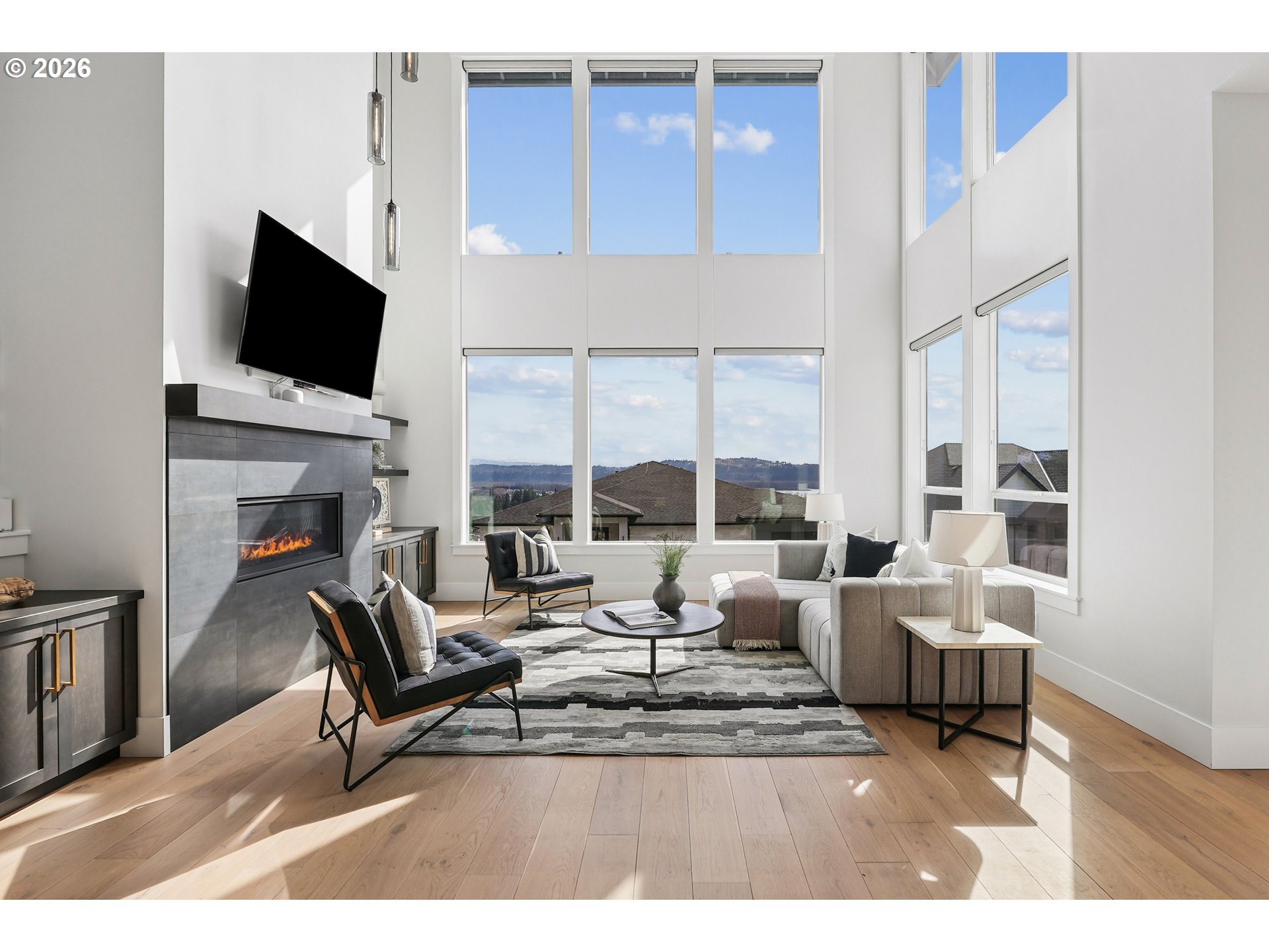 1757 North Columbia Ridge Way Washougal, WA 98671 - Photo 6 of 48 a living room with fireplace furniture and a flat screen tv
