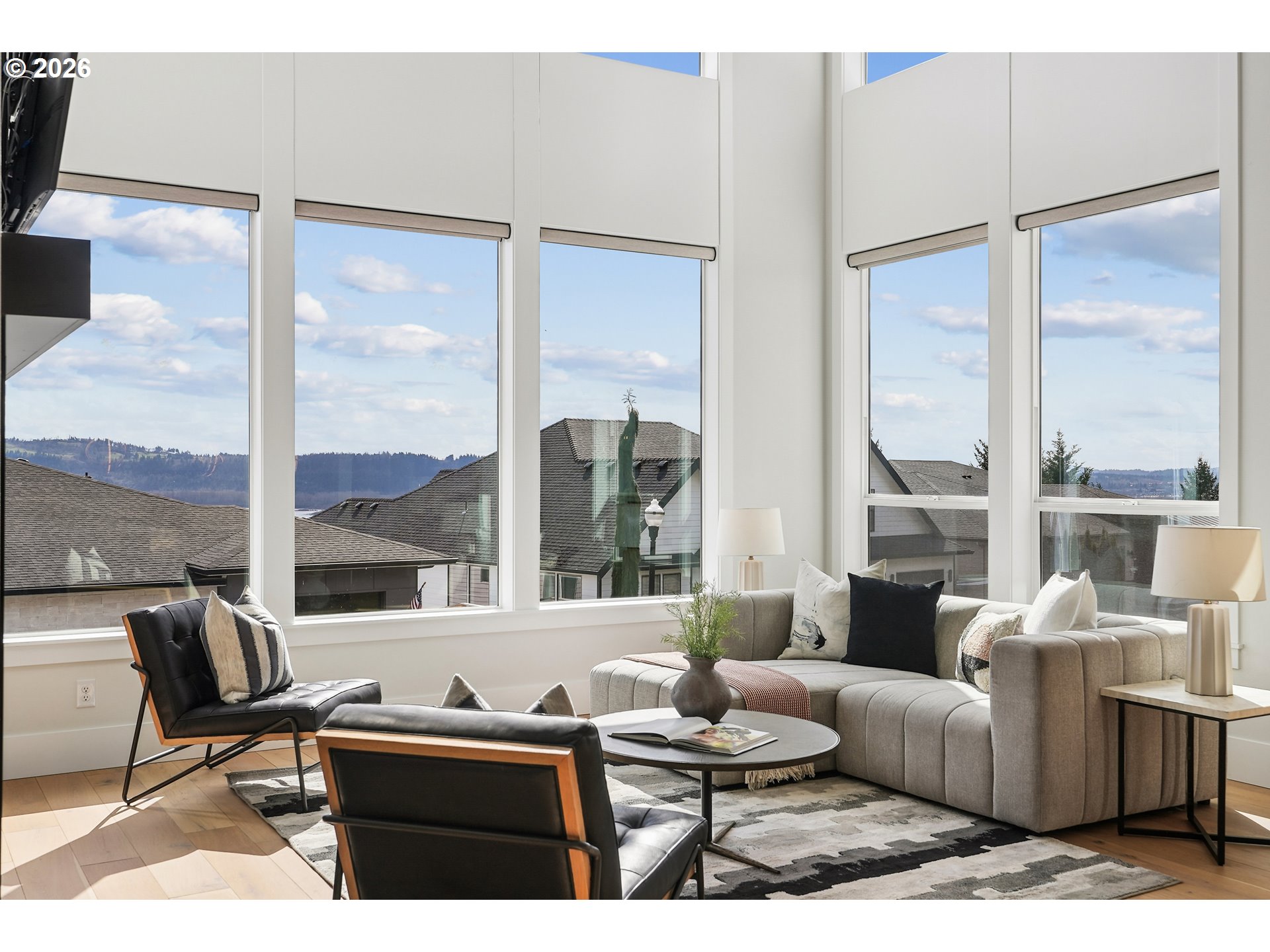 1757 North Columbia Ridge Way Washougal, WA 98671 - Photo 8 of 48 a living room with furniture and a large window