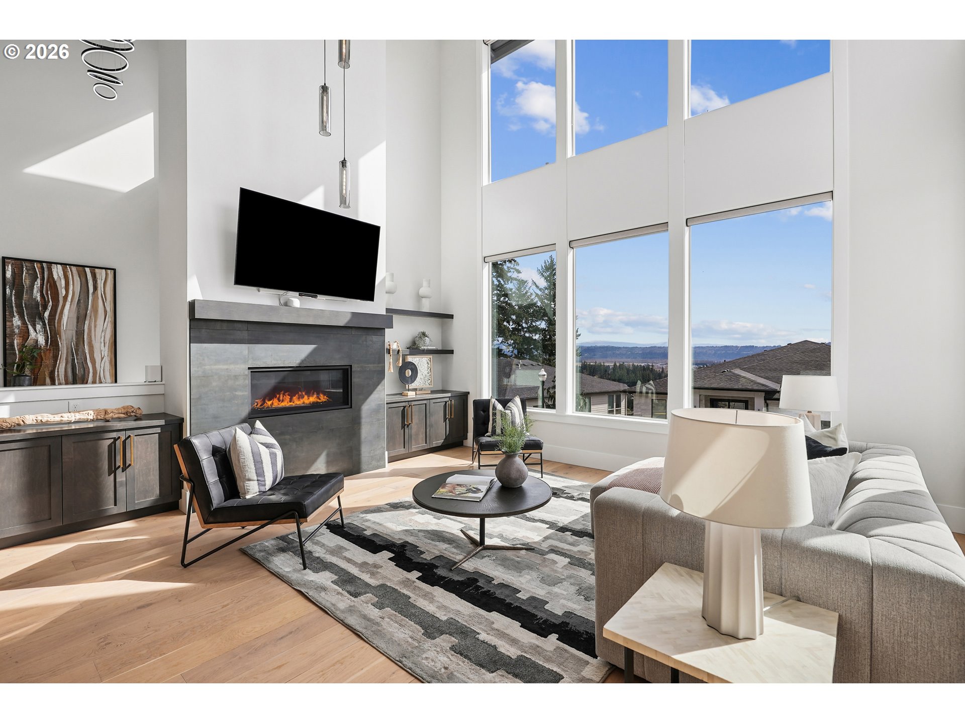 1757 North Columbia Ridge Way Washougal, WA 98671 - Photo 9 of 48 a living room with fireplace furniture and a flat screen tv