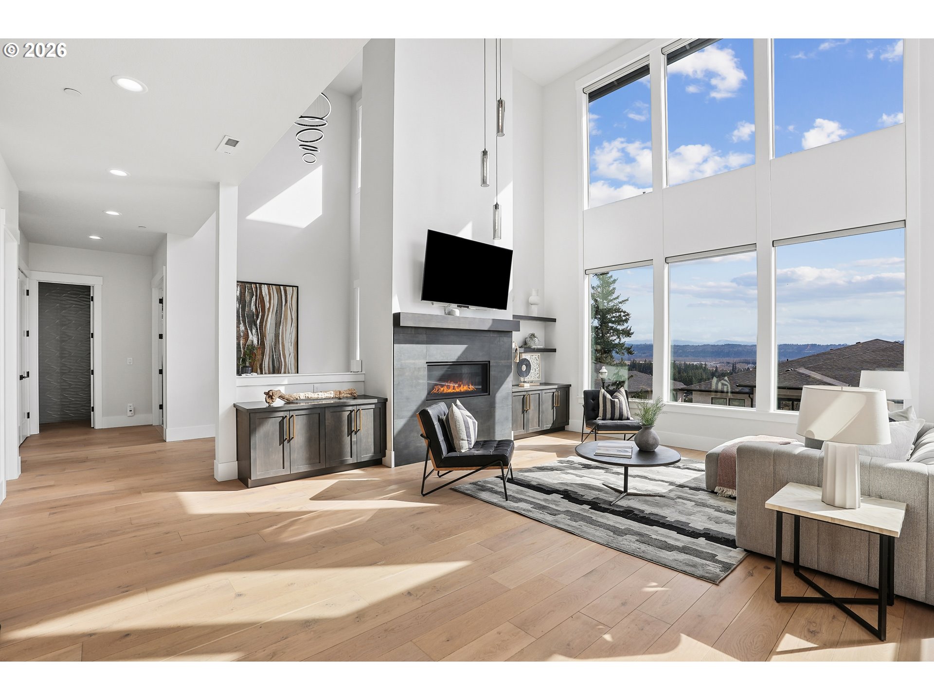 1757 North Columbia Ridge Way Washougal, WA 98671 - Photo 10 of 48 a living room with fireplace furniture and a flat screen tv