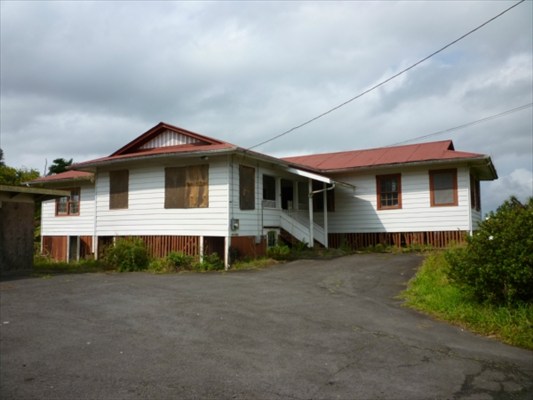 18-1342 Volcano Road Mountain View, HI 96771 - Photo 1 of 1 a front view of a house with a yard