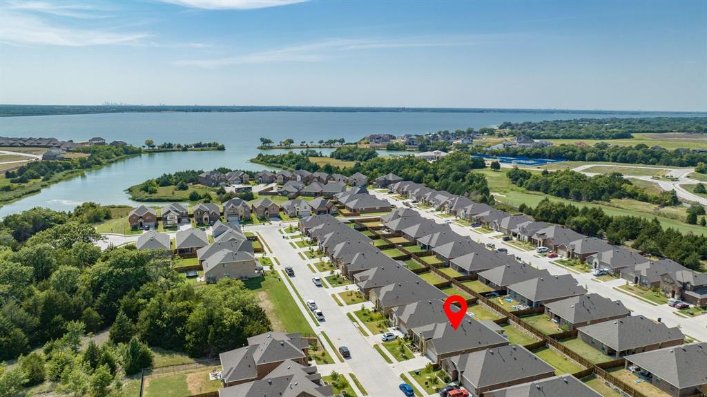 an aerial view of multiple house with outdoor space