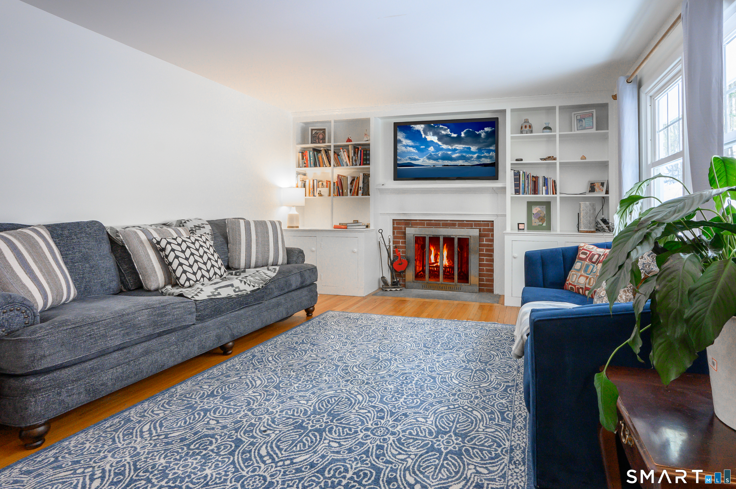 76 South Kent Road Kent, CT 06757 - Photo 3 of 20 a living room with furniture and a fireplace
