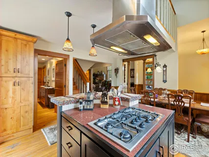 a view of a dining table and chairs