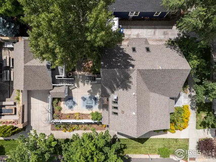 an aerial view of a house with outdoor space