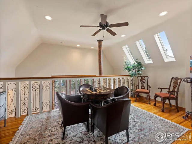 a living room with furniture a window and a sink