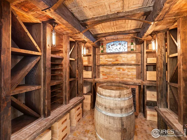 a view of a patio with couches table and chairs and potted plants