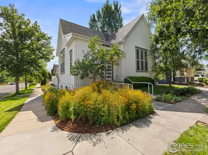a view of a backyard with garden