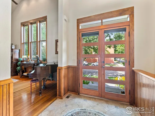 a view of a livingroom with furniture and window