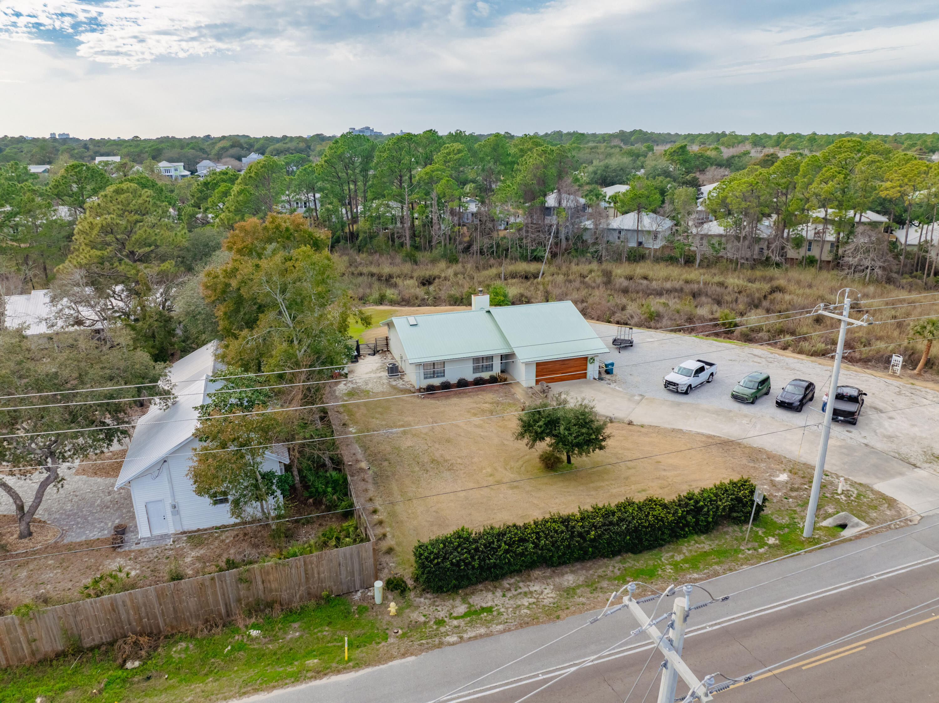 861 Mack Bayou Road Miramar Beach, FL 32550 - Photo 1 of 47 an aerial view of a house with a garden