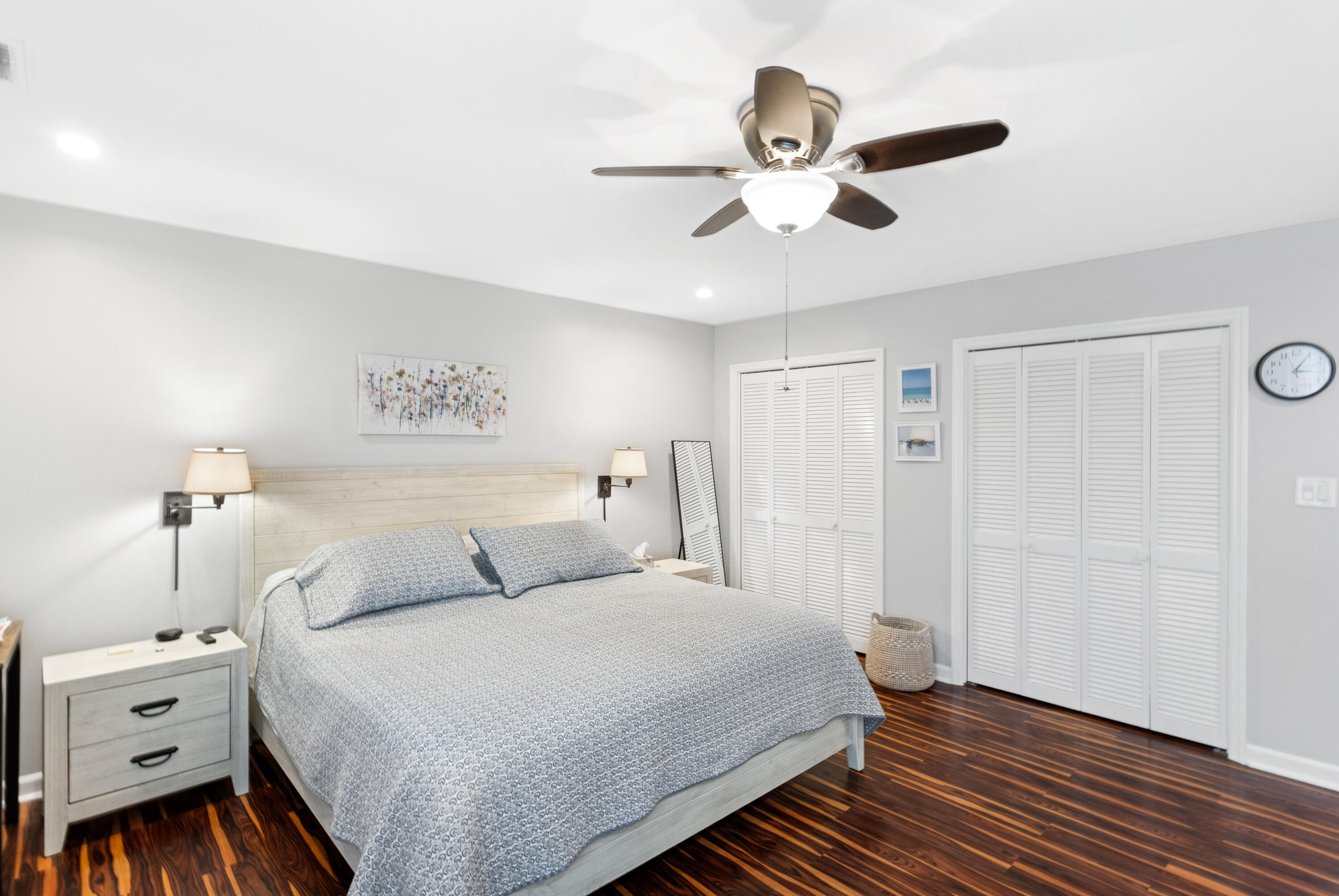 861 Mack Bayou Road Miramar Beach, FL 32550 - Photo 20 of 47 a bedroom with a bed and a chandelier