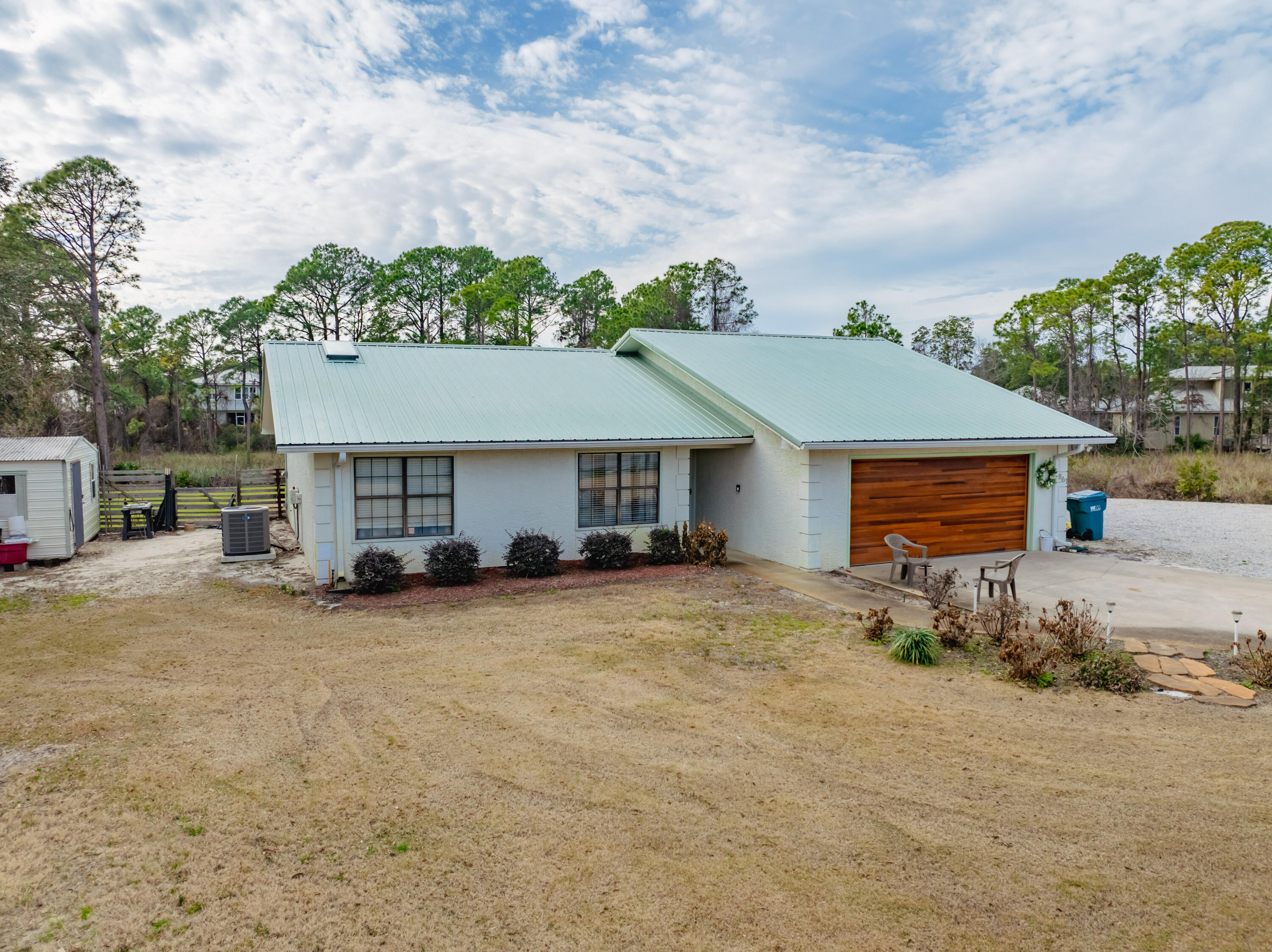 861 Mack Bayou Road Miramar Beach, FL 32550 - Photo 2 of 47 a view of a house with a patio