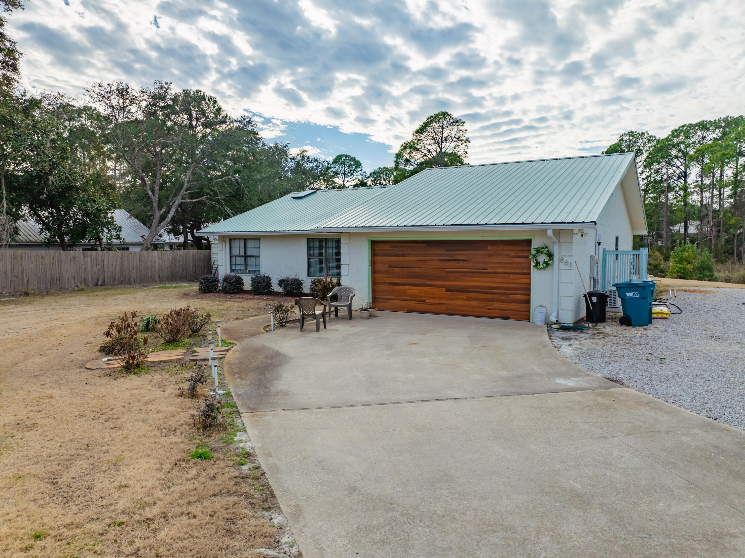 861 Mack Bayou Road Miramar Beach, FL 32550 - Photo 23 of 47 a view of a house with a yard