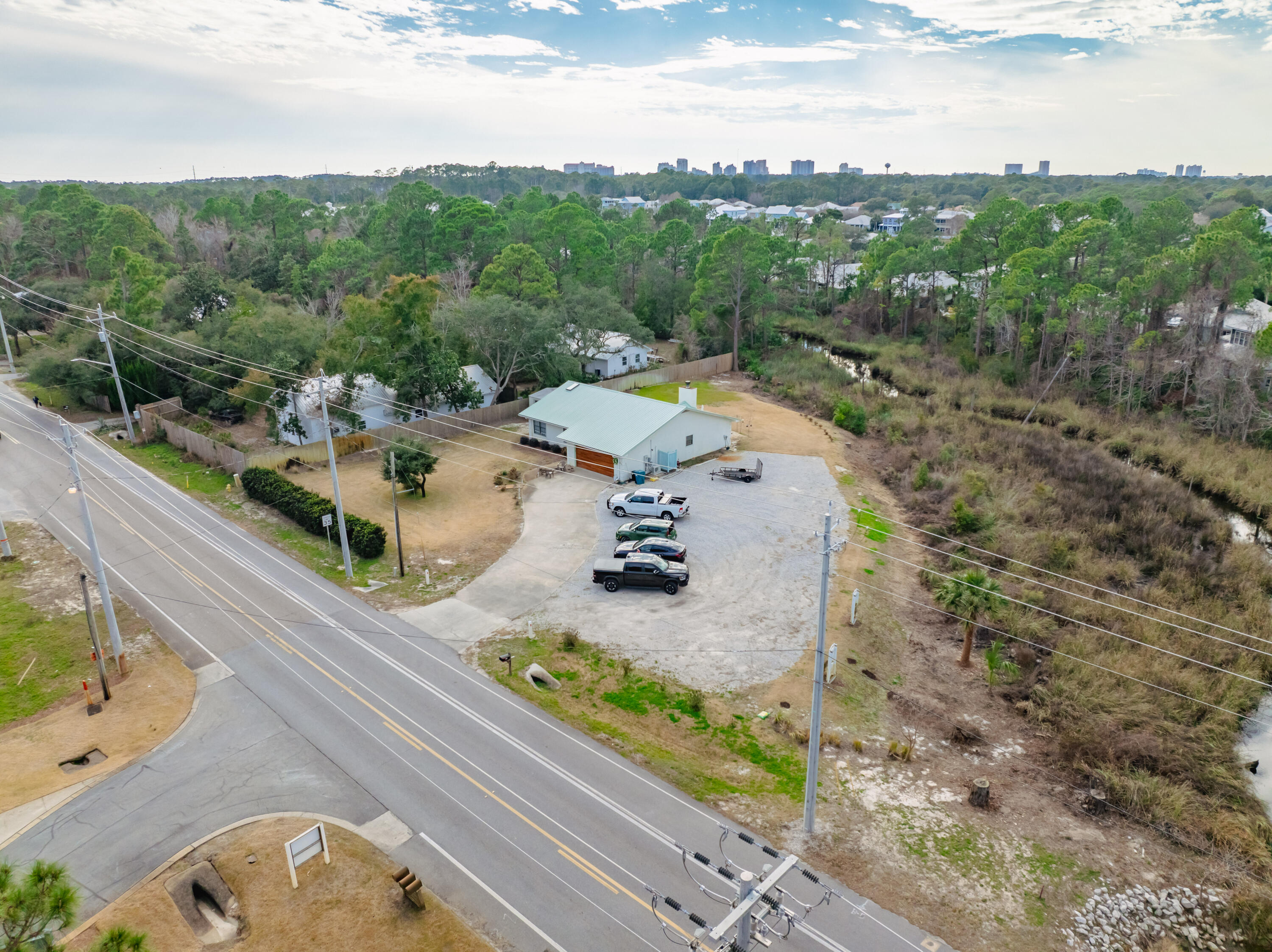 861 Mack Bayou Road Miramar Beach, FL 32550 - Photo 27 of 47 an aerial view of a house with a garden