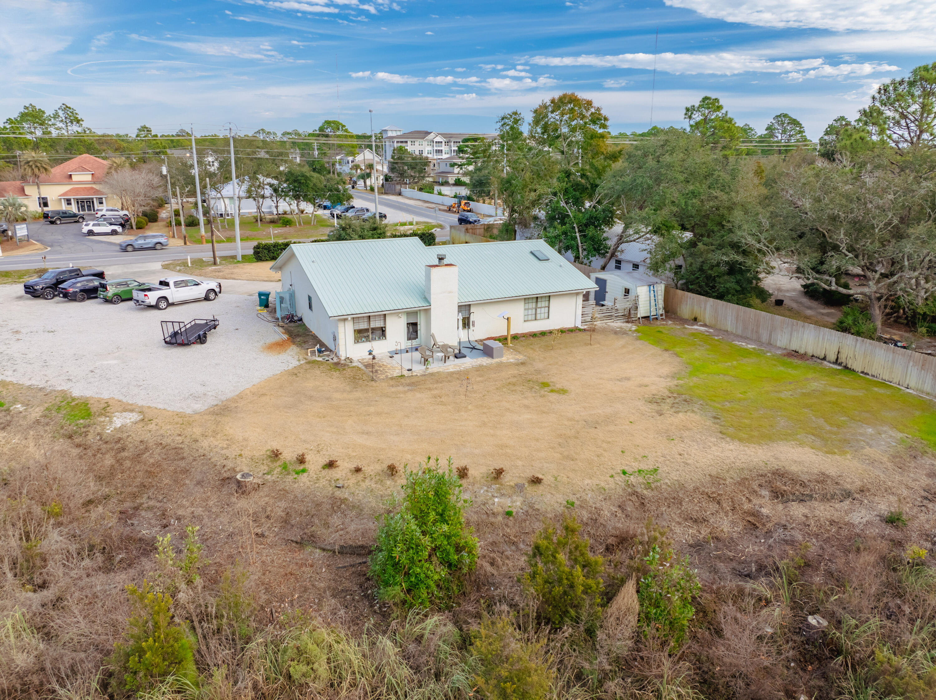 861 Mack Bayou Road Miramar Beach, FL 32550 - Photo 43 of 47 an aerial view of a house with a yard and lake view