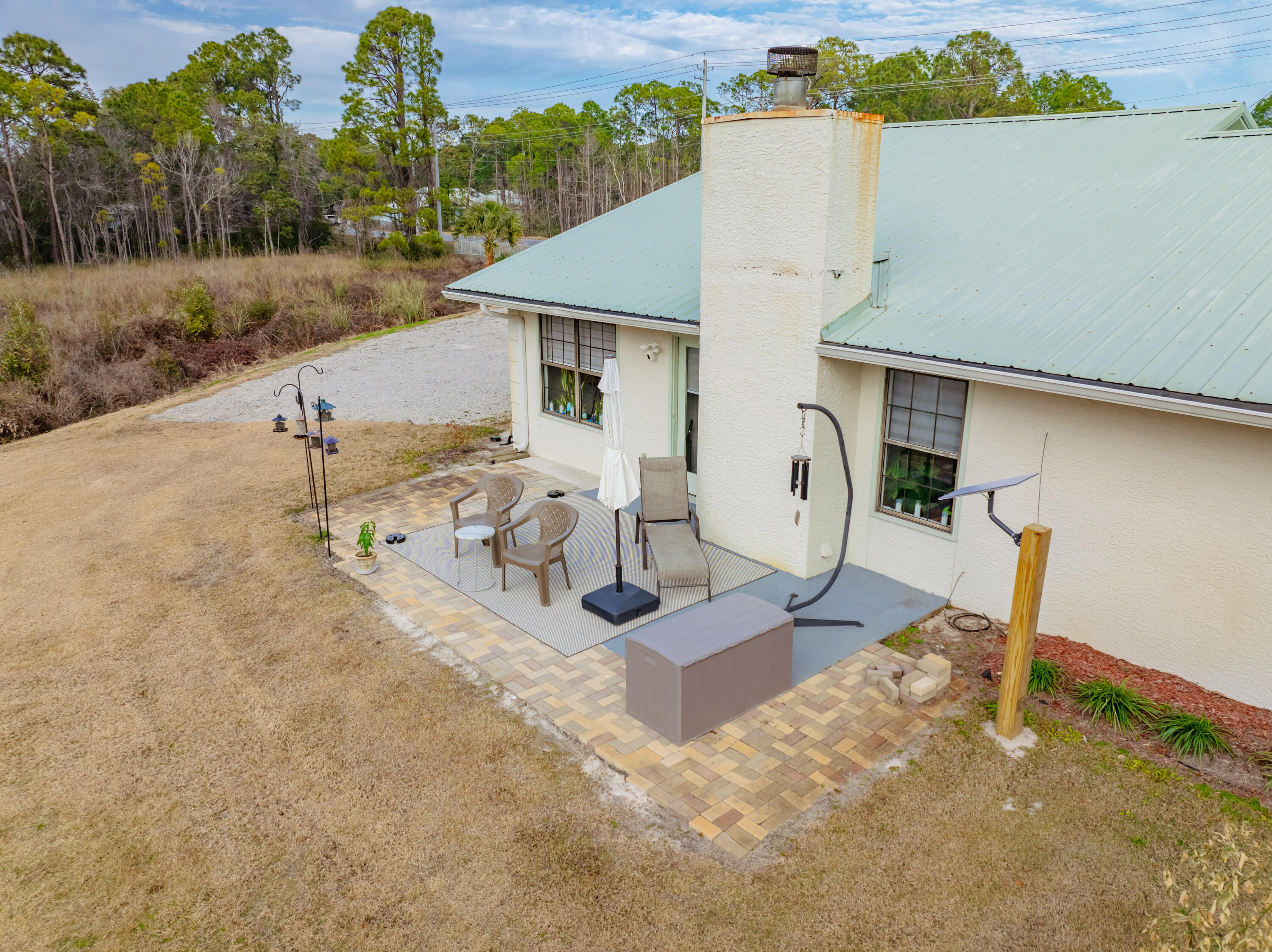 861 Mack Bayou Road Miramar Beach, FL 32550 - Photo 45 of 47 a view of a house with backyard and sitting area