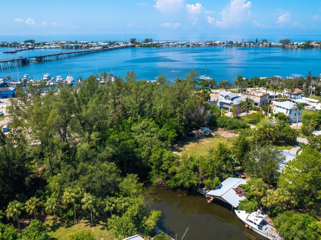 4210 128th Street West Cortez, FL 34215 - Photo 12 of 15 a view of a city with lots of residential buildings lake and ocean view