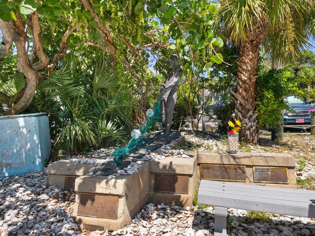 4210 128th Street West Cortez, FL 34215 - Photo 14 of 15 a view of a chairs and table in the patio