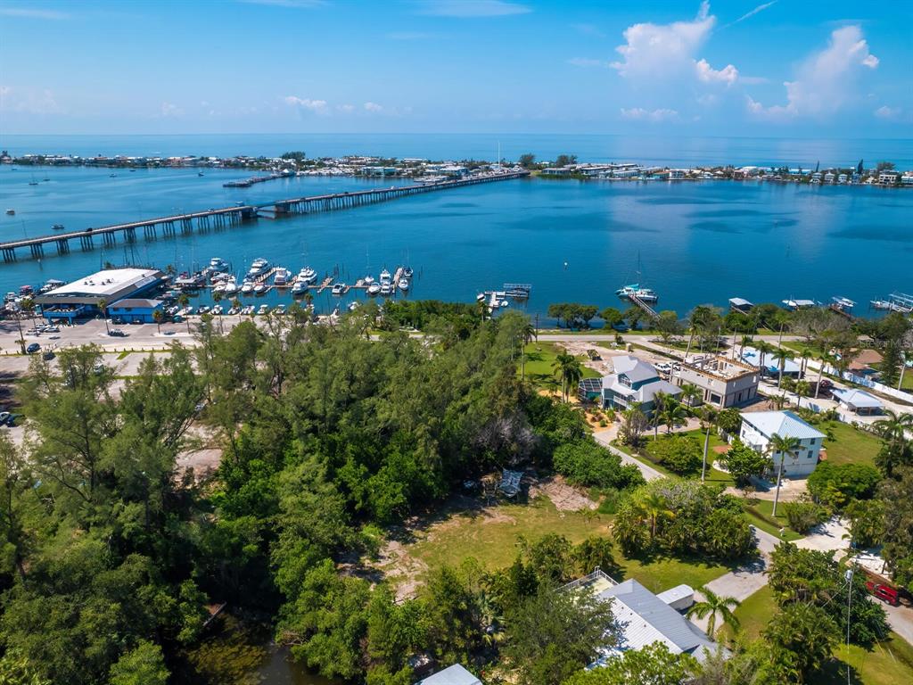 4210 128th Street West Cortez, FL 34215 - Photo 6 of 15 a view of a lake with a city