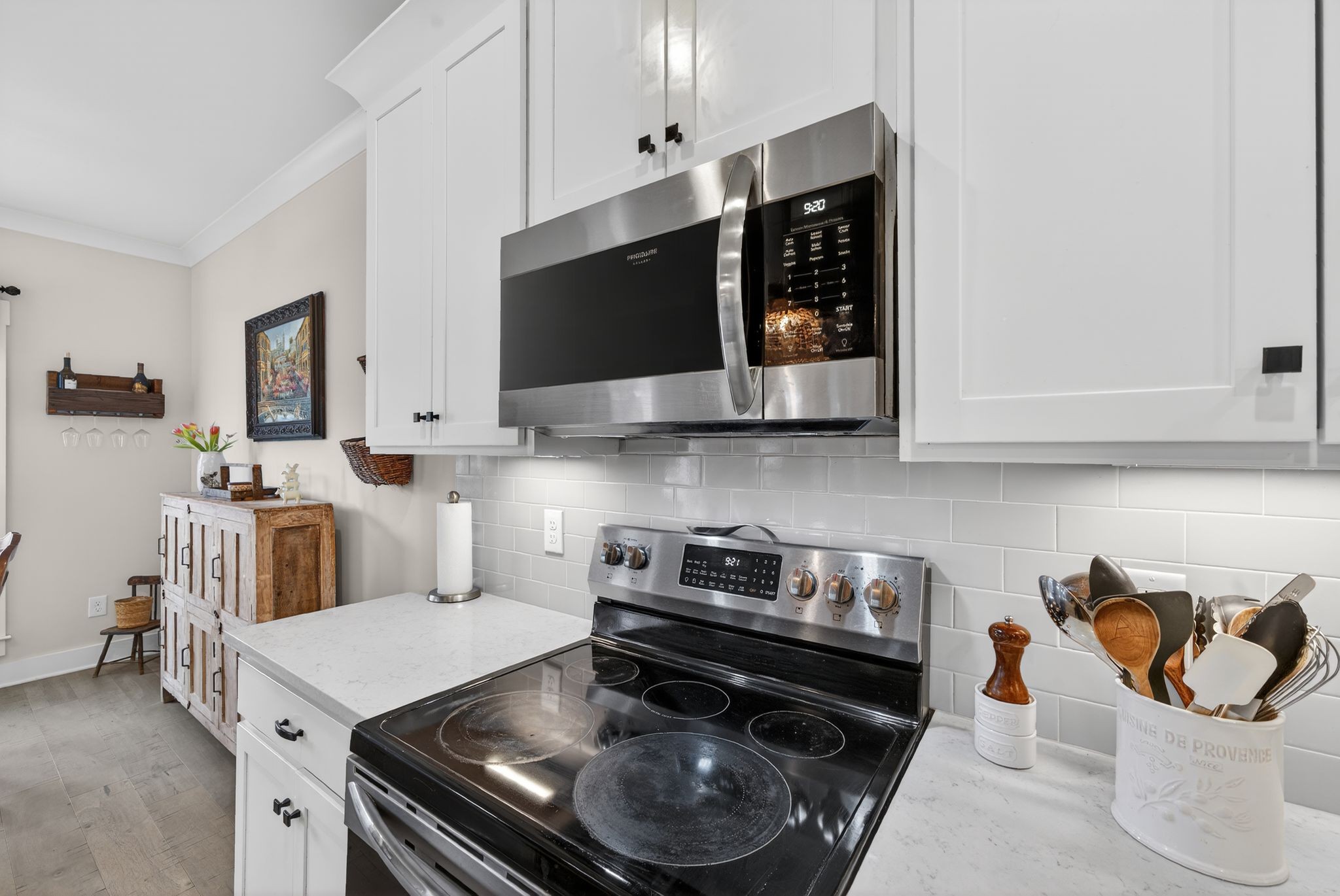 3834 Holly Grove Road Lascassas, TN 37085 - Photo 12 of 60 a kitchen with a stove and a microwave