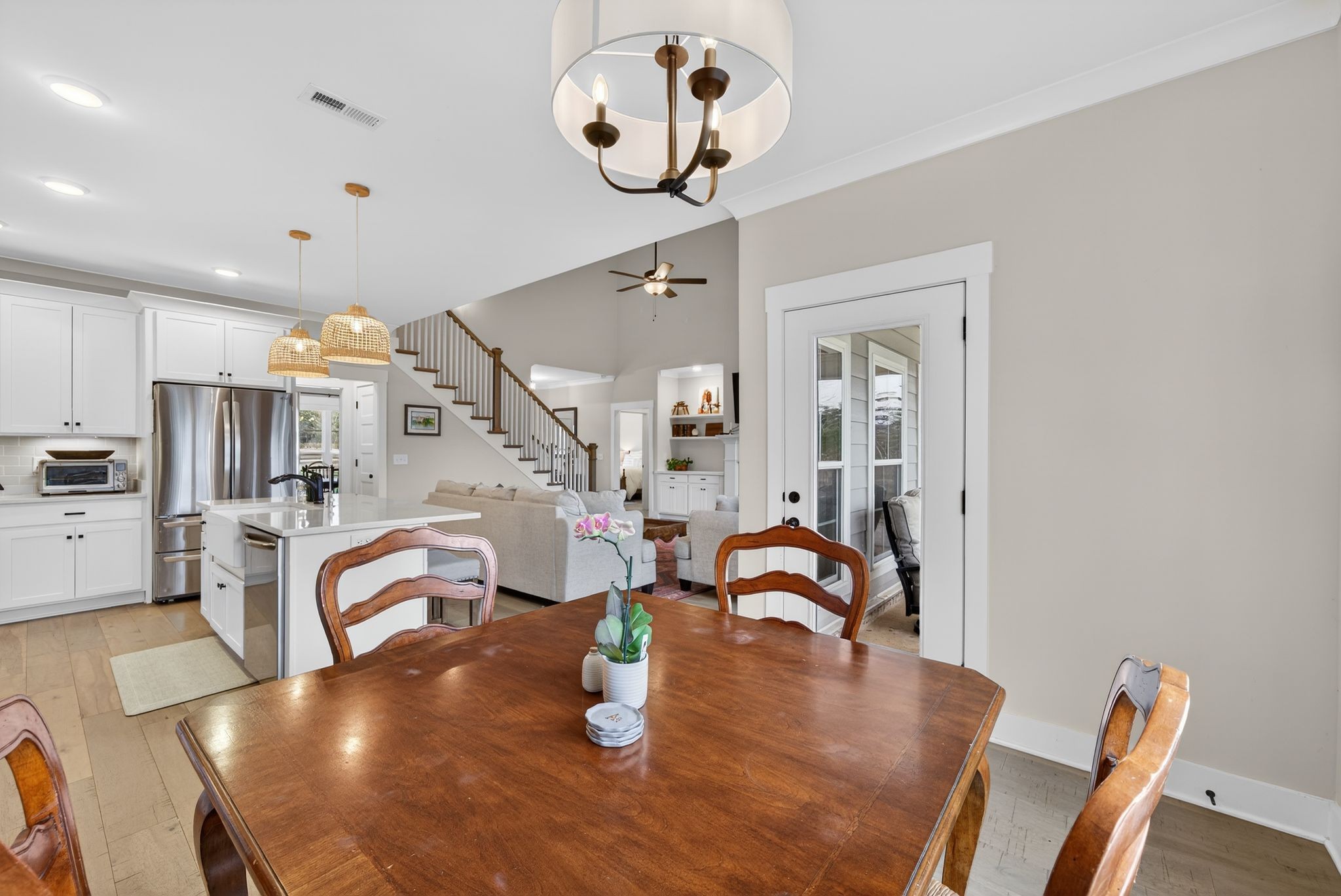 3834 Holly Grove Road Lascassas, TN 37085 - Photo 15 of 60 a dining room with furniture and wooden floor