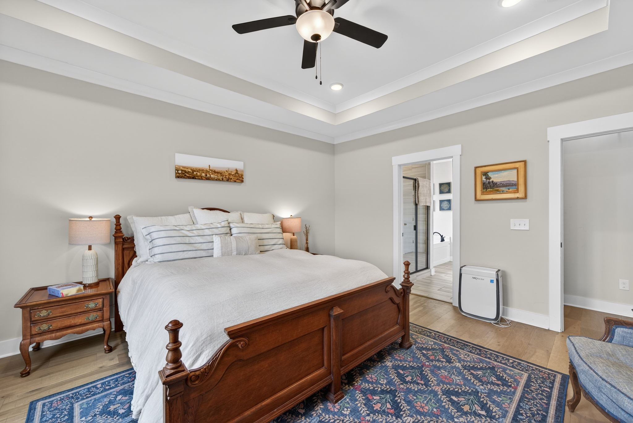 3834 Holly Grove Road Lascassas, TN 37085 - Photo 19 of 60 a bedroom with a bed and a chandelier
