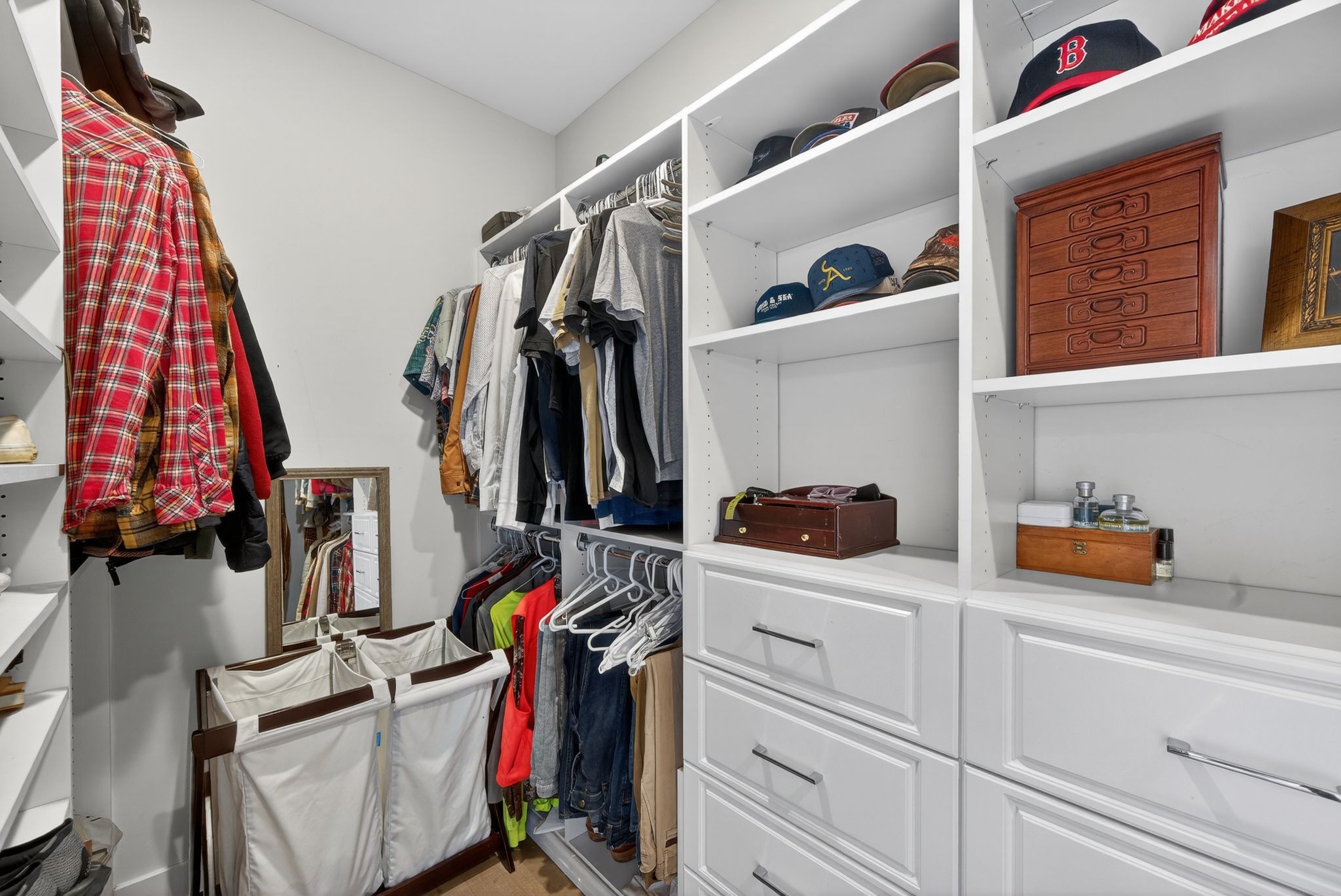 3834 Holly Grove Road Lascassas, TN 37085 - Photo 22 of 60 a view of walk in closet with clothes and shoes