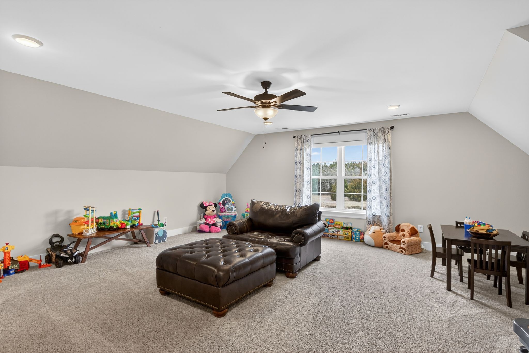 3834 Holly Grove Road Lascassas, TN 37085 - Photo 29 of 60 a living room with furniture and a chandelier