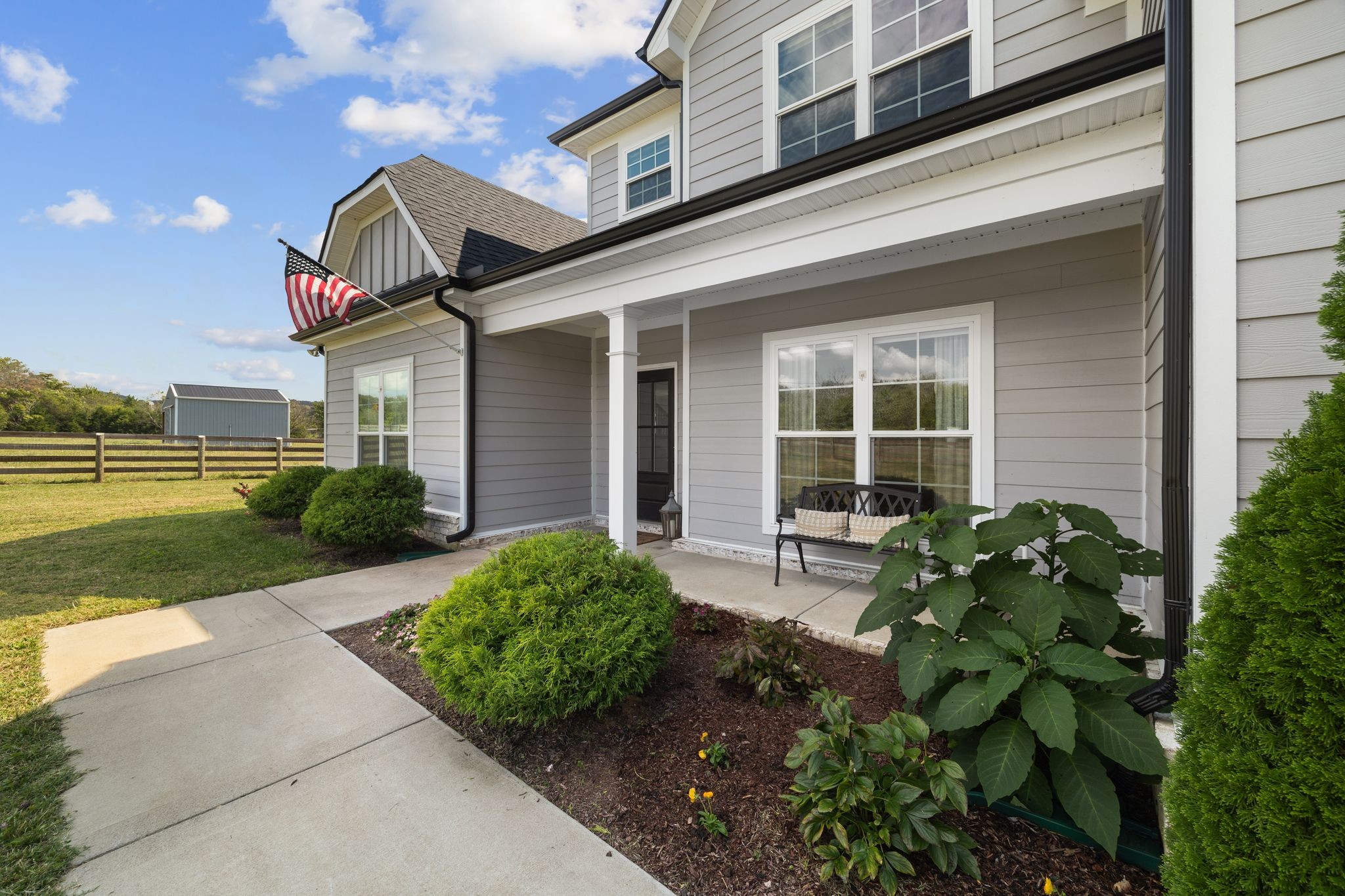 3834 Holly Grove Road Lascassas, TN 37085 - Photo 40 of 60 a front view of a house with garden