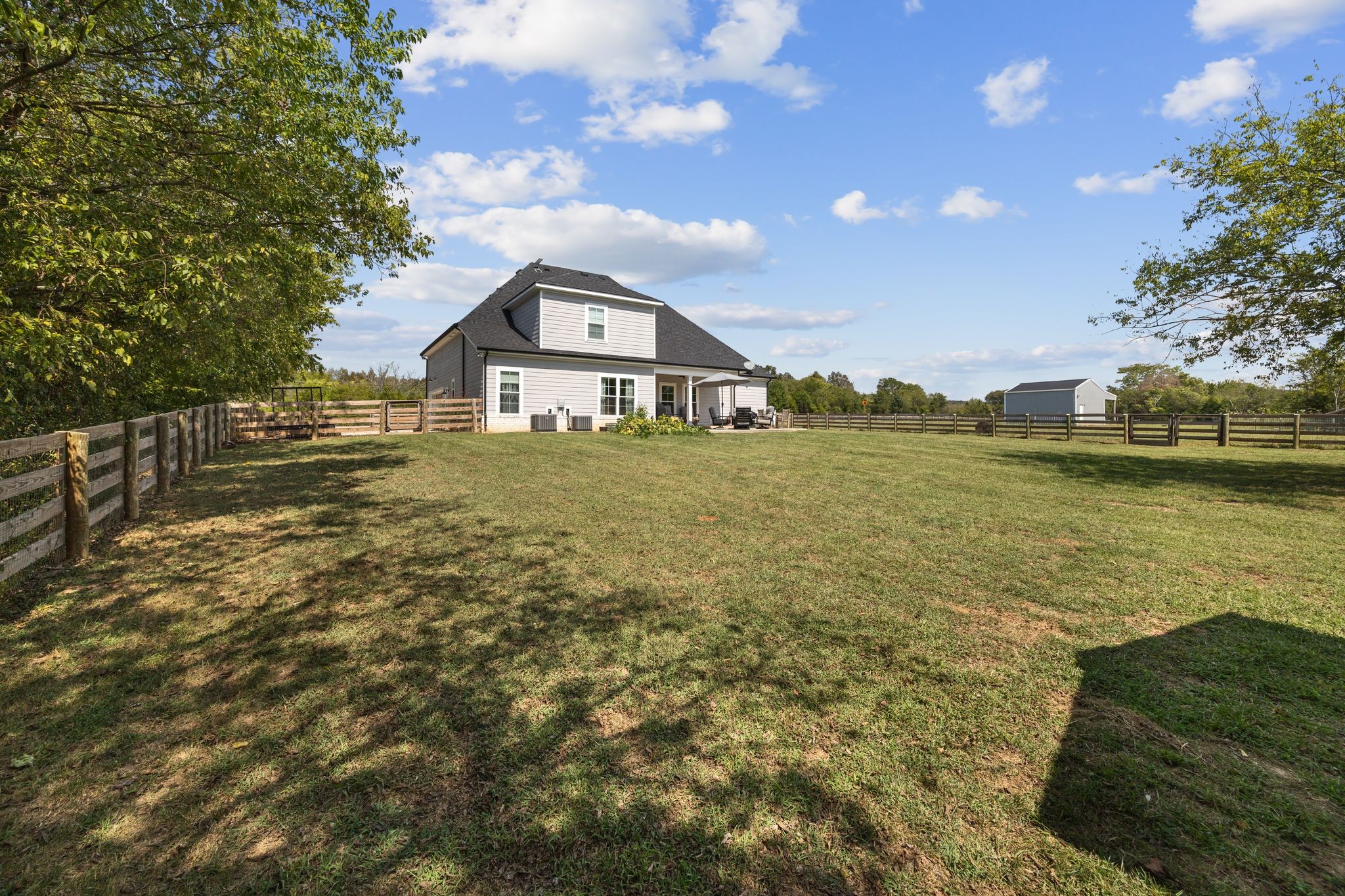 3834 Holly Grove Road Lascassas, TN 37085 - Photo 43 of 60 a view of a large body of water with a building in the background