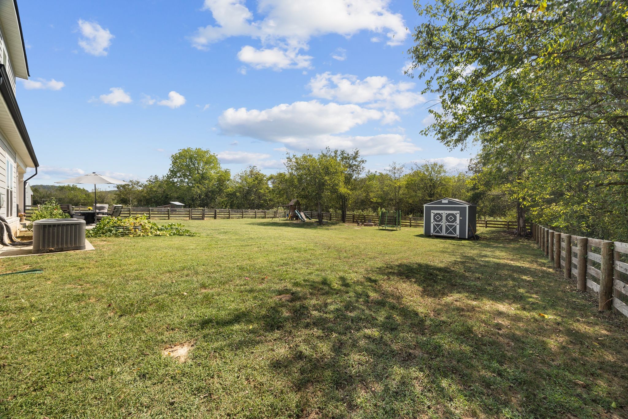 3834 Holly Grove Road Lascassas, TN 37085 - Photo 50 of 60 a front view of a house with a yard