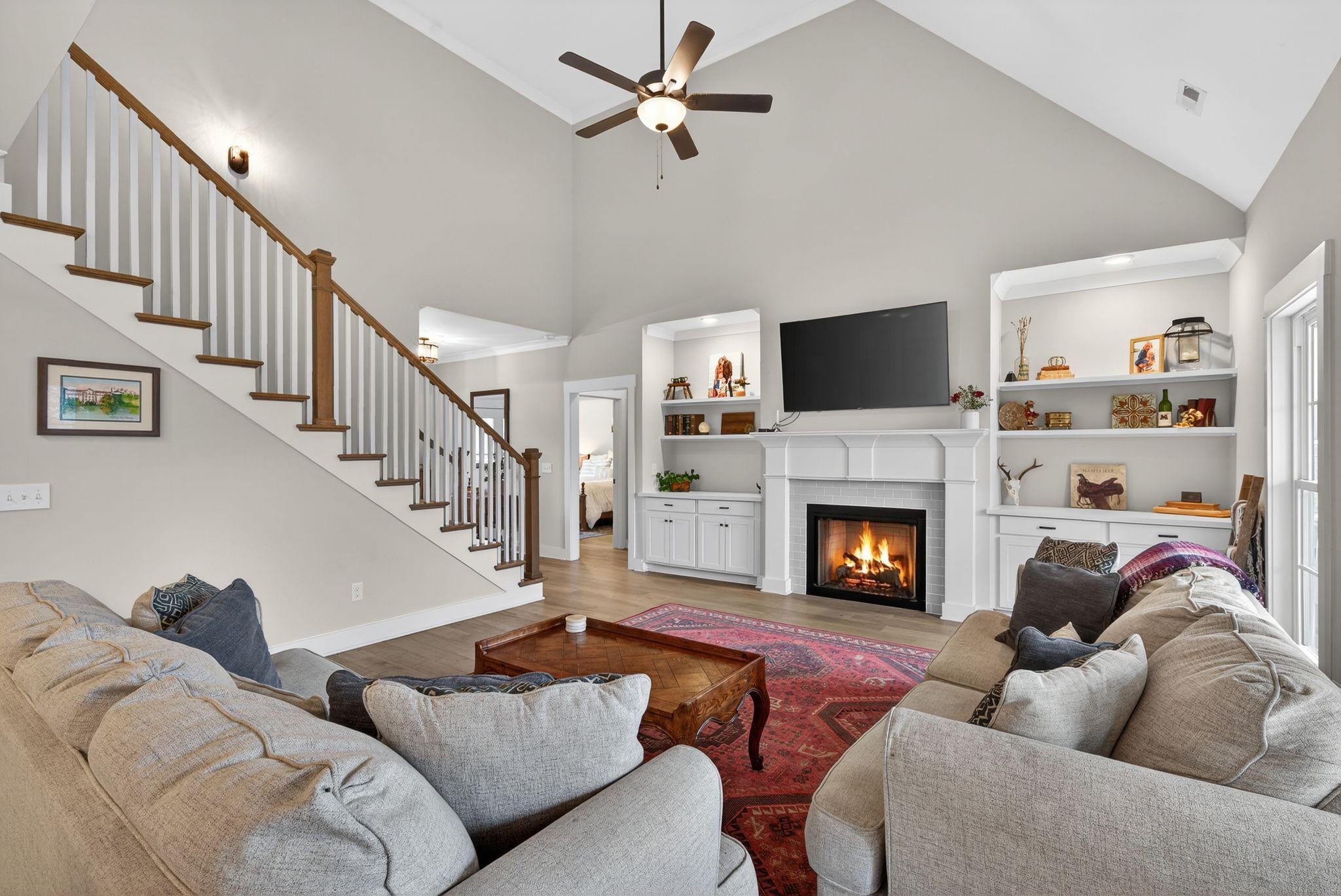 3834 Holly Grove Road Lascassas, TN 37085 - Photo 6 of 60 a living room with furniture fireplace and a flat screen tv