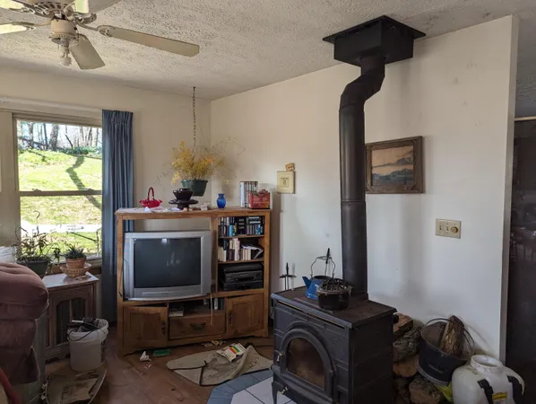 a room with furniture and flat screen tv