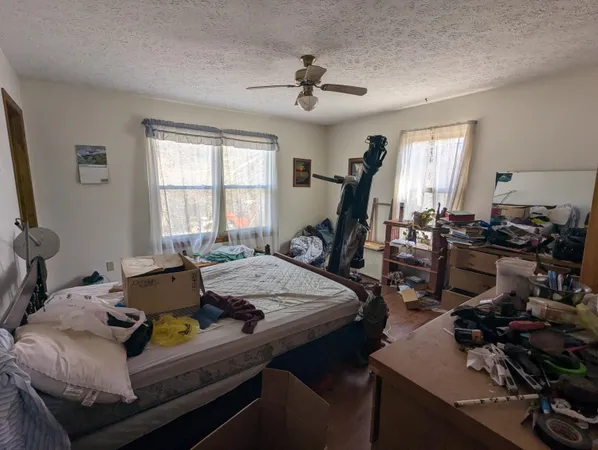 a bathroom with a sink toilet and mirror