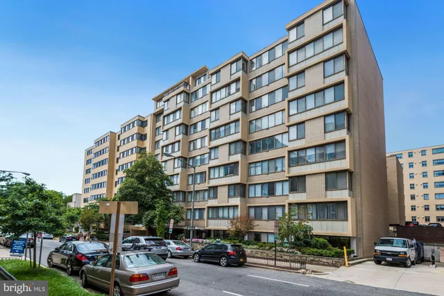 a front view of a building with street view