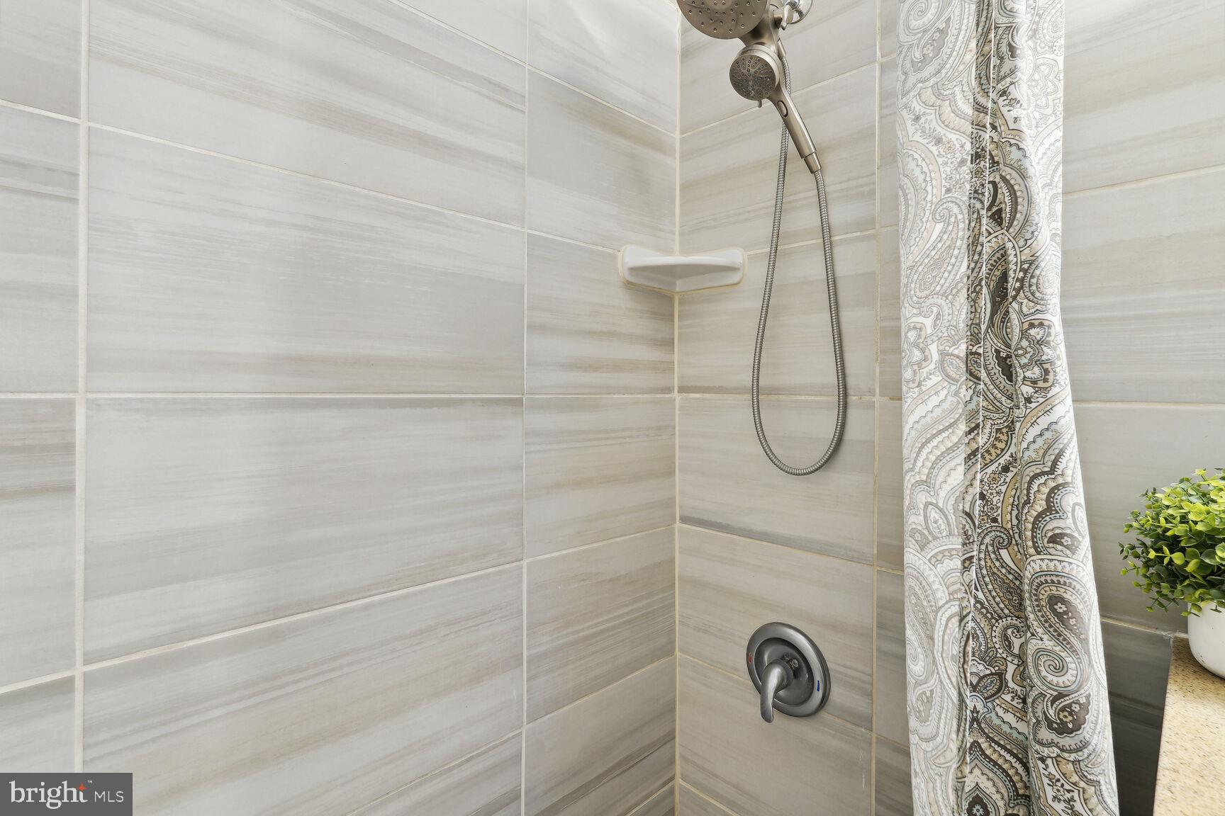 522 21st Street Northwest, Unit 903 Washington, DC 20037 - Photo 16 of 20 a bathroom with a shower