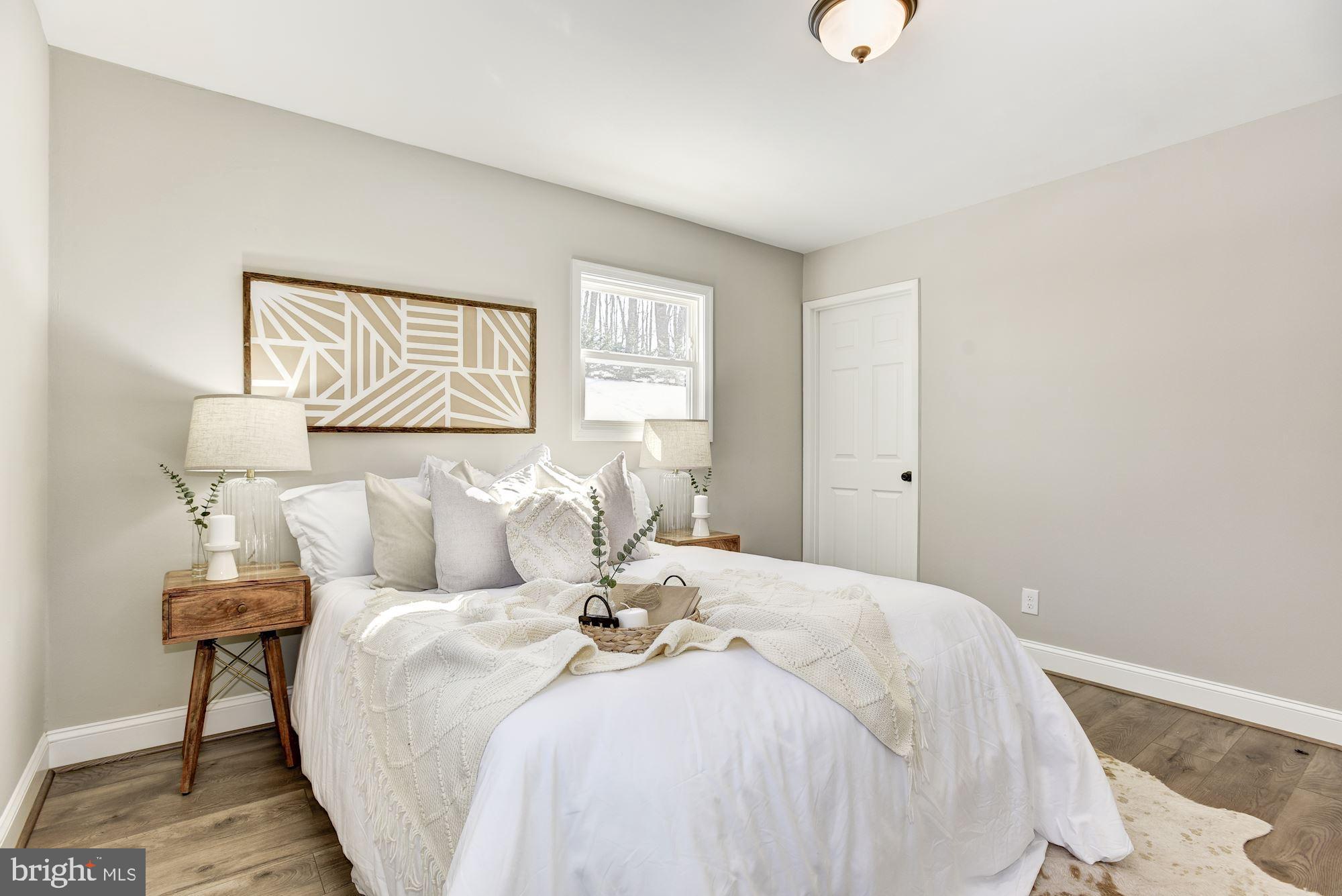 1903 Carrs Mill Road Fallston, MD 21047 - Photo 11 of 31 a bedroom with a bed and lamps