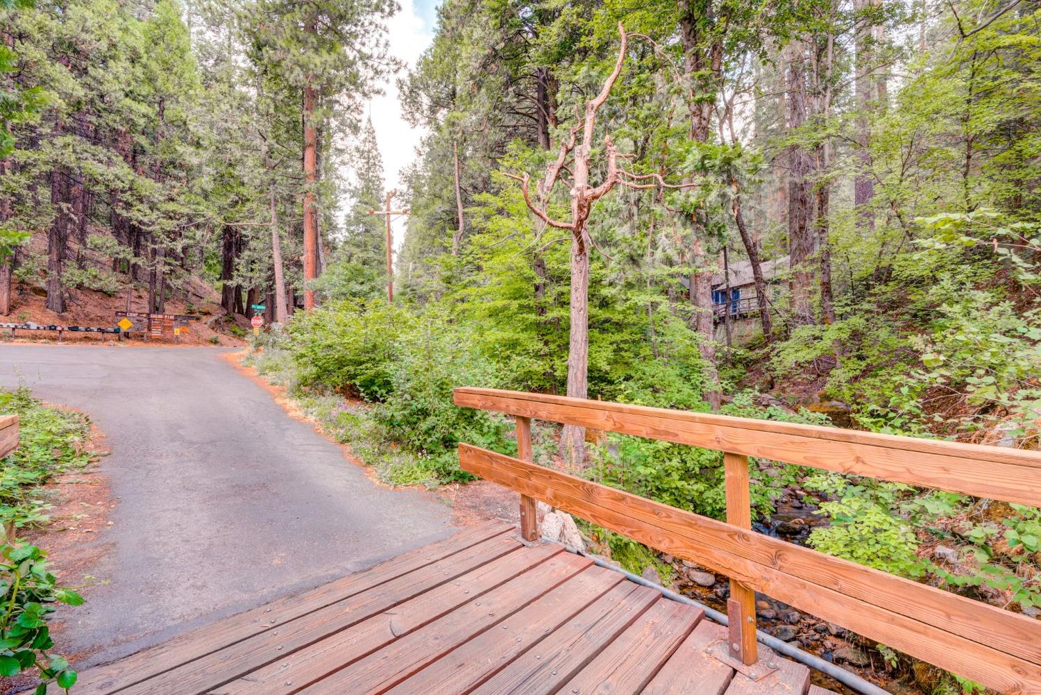 50062 Poplar Road Oakhurst, CA 93644 - Photo 37 of 38 a view of a wooden bridge