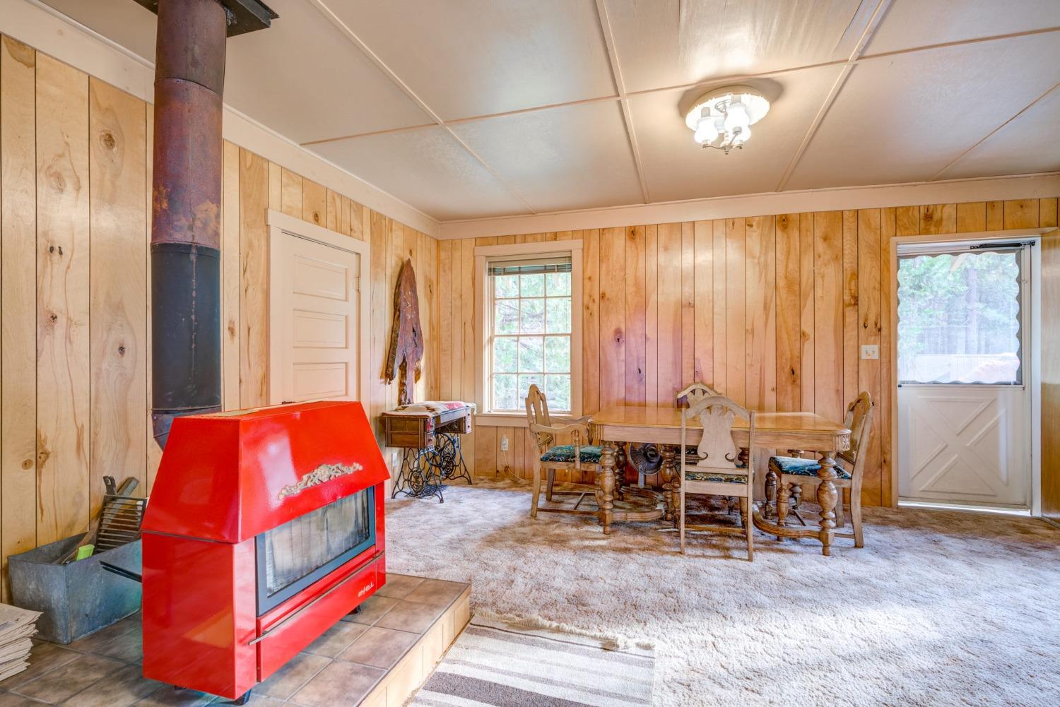 50062 Poplar Road Oakhurst, CA 93644 - Photo 8 of 38 a living room with furniture and large windows