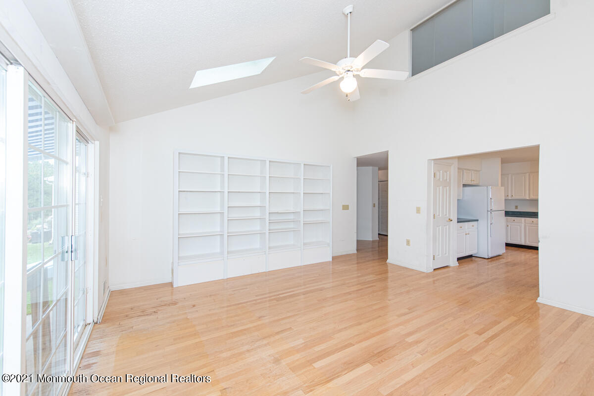 5 Dexter Lane Jackson, NJ 08527 - Photo 19 of 55 wooden floor in an empty room with a bathroom